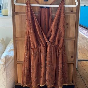 Buckle sequence terra-cotta top